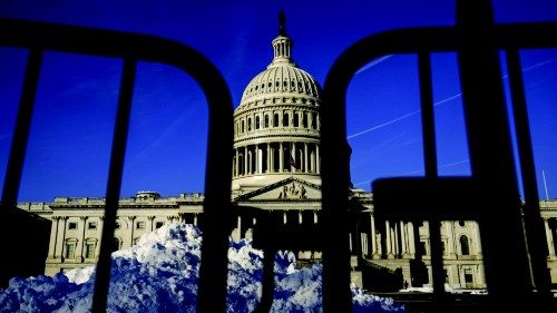 WASHINGTON, DC - JANUARY 4: The U.S. Capitol is see through security bike racks on January 4, 2022 ...