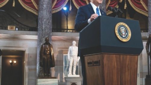epa09670067 President Joe Biden gives remarks in Statuary Hall of the U.S Capitol in Washington, ...