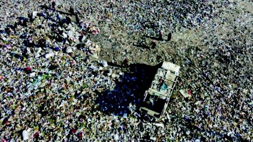 An aerial view shows displaced Syrians, who fled their homes in the countrysides of Raqa and Deir ...