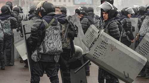 epa09676292 Kazakh policemen during protests over a hike in energy prices in Almaty, Kazakhstan, 05 ...