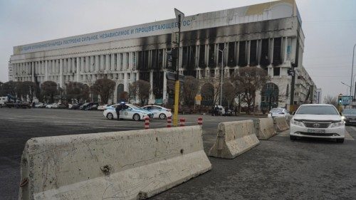 epa09678689 A general view of the burned and looted city hall of Almaty in the aftermath of riots in ...