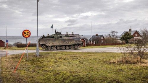 Gotland's Regiment patrols the roads in a tank, amid increased tensions between NATO and Russia over ...