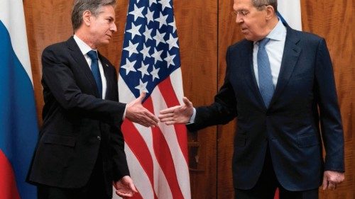 TOPSHOT - US Secretary of State Antony Blinken (L) greets Russian Foreign Minister Sergey Lavrov ...