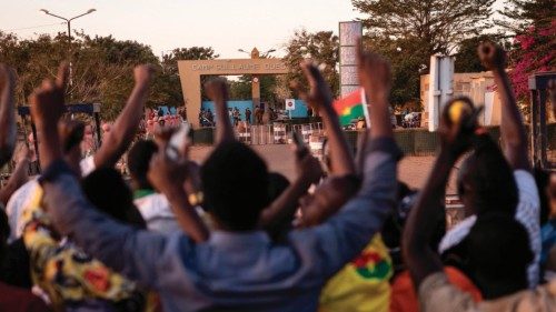TOPSHOT - People gather at Nation square to celebrate and support the Burkina Faso military in ...