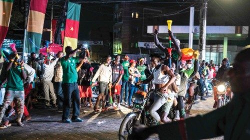 Cameroon's fans celebrate in Douala, western Cameroon, on January 24, 2022, after Cameroon won the ...