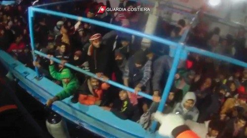 epa09708257 A handout photo made available by Italian Coast Guards shows migrants rescue operation, ... epa09708257 A handout photo made available by Italian Coast Guards shows migrants rescue operation, ...