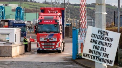 A lorry leaves Larne port, north of Belfast in Northern Ireland, after arriving on a ferry from ...
