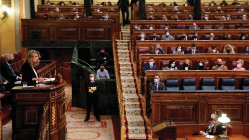 epa09724329 Spanish Labor Minister Yolanda Diaz addressing the Lower House plenary session in which ...