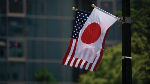 (FILES) In this file photo taken on May 27, 2016 a Japanese and a US flag are seen next to the ...