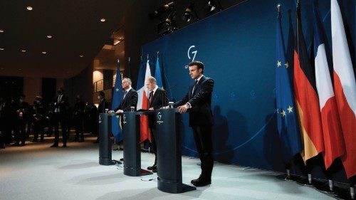 German Chancellor Olaf Scholz, Polish President Andrzej Duda and French President Emmanuel Macron ...