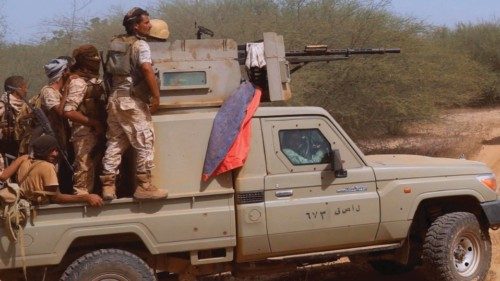 Yemeni pro-government fighters man a position near al-Muhsam camp during fighting to drive  the ...