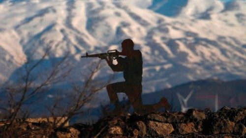 A metal cutout of an Israeli soldier at an army post in Mount Bental near the Syrian border in the ...