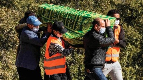 Moroccans carry the body of five-year-old Rayan Oram during his funeral in the village of Ighrane in ...