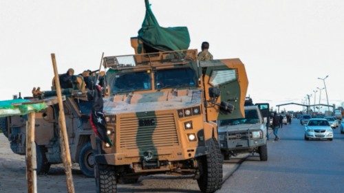 Vehicles of military brigades loyal to the Libyan unity government headed by Abdulhamid Dbeibah ...