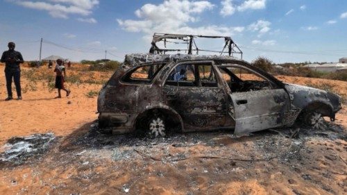 The wreckage of a car is seen burnt following an overnight attack in Mogadishu, Somalia, February ...