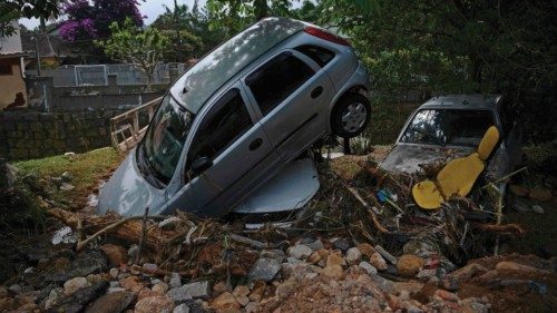 View of cars destroyed by a flash flood in Petropolis, Brazil on February 16, 2022. - Large scale ...