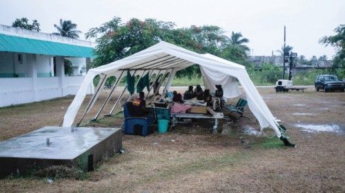 FILE PHOTO: Patients are kept outside the OFATMA hospital during a power outage after the August 14 ...