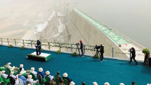 Delegates attend the ceremony at the Grand Ethiopian Renaissance Dam (GERD) as it began producing ...
