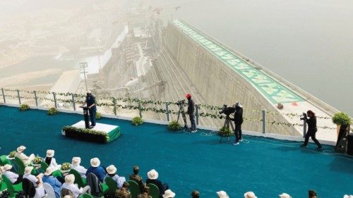 Delegates attend the ceremony at the Grand Ethiopian Renaissance Dam (GERD) as it began producing ... Delegates attend the ceremony at the Grand Ethiopian Renaissance Dam (GERD) as it began producing ...