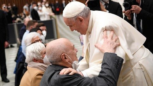 This handout picture made available by Vatican Media Press Office shows Pope Francis giving the ...