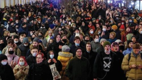 People attend an anti-war protest, after Russian President Vladimir Putin authorized a military ...