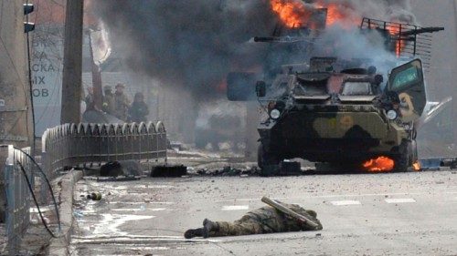 CORRECTION / TOPSHOT - This photograph taken on February 27, 2022 shows a Russian Armoured personnel ...