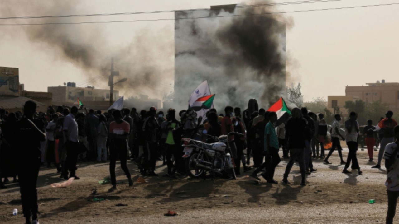 FILE PHOTO: Protesters march during a rally against military rule following coup in Khartoum, Sudan, ...