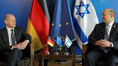 epa09795967 Israel's Prime Minister Naftali Bennett (R) meets with German Chancellor Olaf Scholz (L) ...