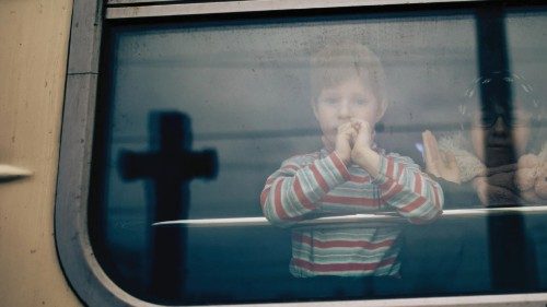 epa09797803 Refugees from Ukraine wait at the railway station in Chelm, from where they will take a ...