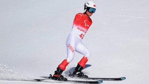 A Chinese paralympic athlete skis during a training session for the men's downhill sitting event at ...