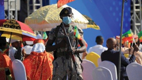 FILE PHOTO: A police officer stands guard during a pro-government rally to denounce what the ...