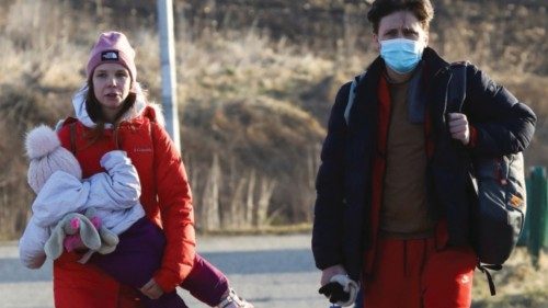 Alexander Bazhanov, 34, a technical manager from Mariupol walks at the border crossing between ...