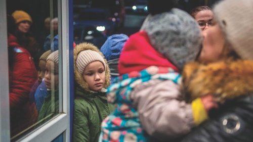 Ukrainian women and children are seen at the Slovak-Ukrainian border crossing at Vysne Nemecke on ...