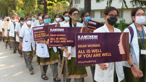 Medical students from Kamineni Hospitals hold placards as they take part in a rally to create ...