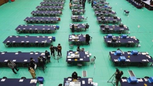 epa09809151 Officials test ballot sorting machines at a polling station in Seoul, South Korea, 08 ...
