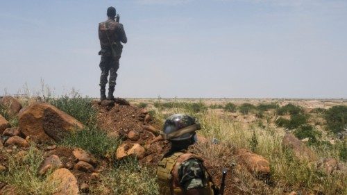 Niger's soldiers stand guard and patrol, on September 10, 2021 near the construction site of the ...