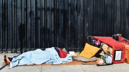 (FILES) In this file photo taken on February 16, 2022, a homeless person on the streets of Los ...