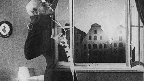 German actor Max Schreck (1879 - 1936), as the vampire Count Orlok, being destroyed by sunlight, in ...