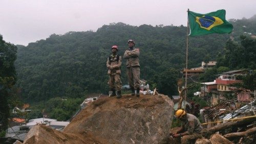 Firefighters are seen during a rescue mission after a giant landslide at Caxambu neighborhood in ... Firefighters are seen during a rescue mission after a giant landslide at Caxambu neighborhood in ...
