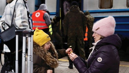 People arrive in a Ukrainian train from Lviv that is transporting hundreds of people fleeing from ... People arrive in a Ukrainian train from Lviv that is transporting hundreds of people fleeing from ...