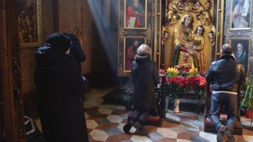 People pray at Church of the Holy Apostles Peter and Paul, amid Russia's invasion of Ukraine, in ...