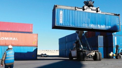 Containers filled with Italian waste illegaly imported into Tunisia are loaded onto a ship to be ...