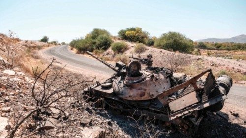 (FILES) In this file photo taken on November 22, 2020 A damaged tank stands abandoned on a road near ...