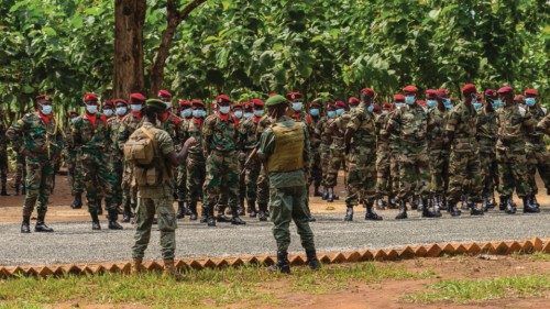 Central Africa Republic's armed forces attend a military parade at Camp Kasai to celebrate the 61st ...