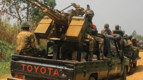 Vehicles of FARDC (Armed Forces of the Democratic Republic of Congo) soldiers escort civilian ...