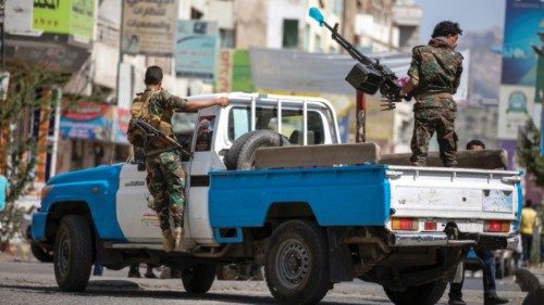 Yemeni security forces patrol the area where UN special envoy for Yemen was holding a meeting with ...