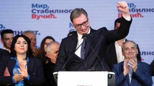 Serbian President and presidential candidate Aleksandar Vucic reacts after the results of the ...