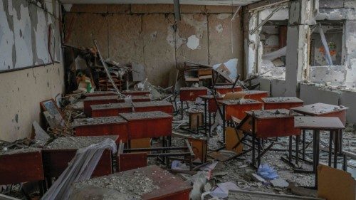 This picture shows a destroyed classroom in a school hit by Russian rockets in the southern Ukraine ...