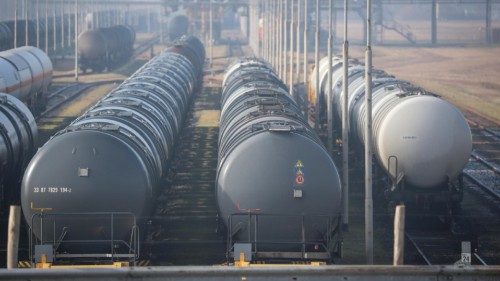 epa09798624 Tank wagons on the premises of the HES oil depot at the port of Wilhelmshaven, northern ...