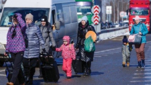 CHERNIVTSI, UKRAINE - MARCH 09: A photo taken from Ukrainian border shows Ukrainians walk with ...